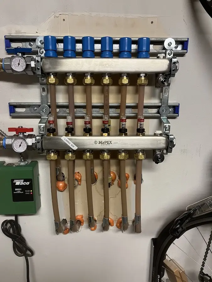 Plumber performing Gas Line Installation at a residential property in Liberty Triangle